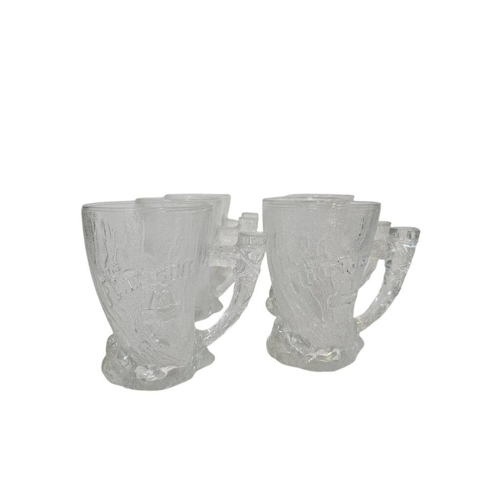 Set of 6 clear glass McDonald's Mammoth Mugs, 1993.